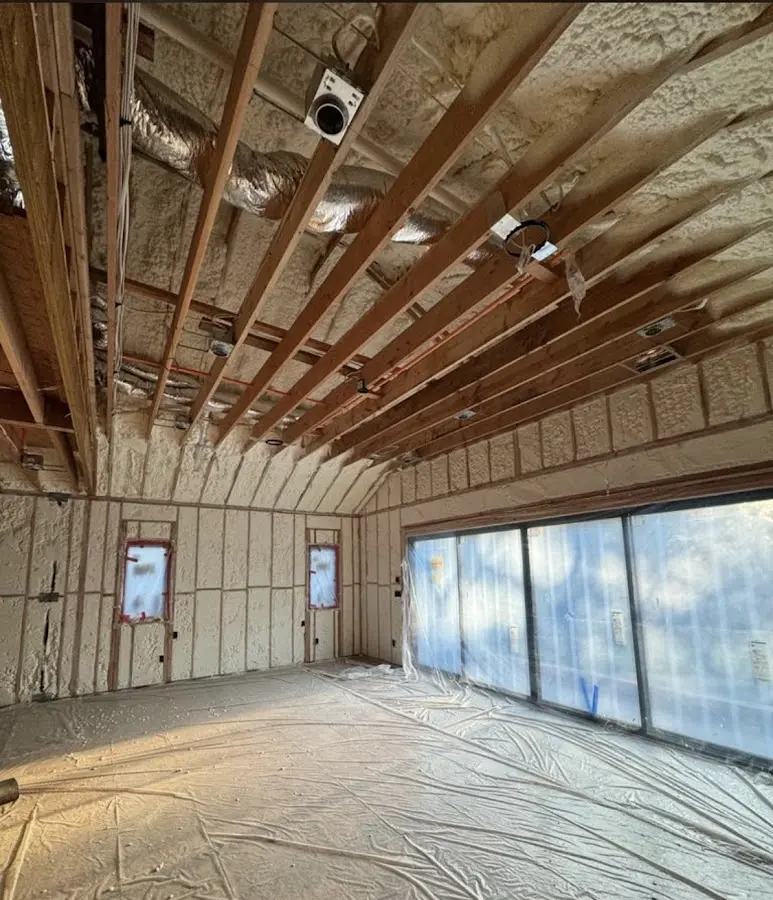 Interior walls and ceiling insulated with spray foam during new construction in Springville